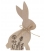 Dřevěný zajíc s dekorem louky na postavení