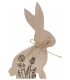 Dřevěný zajíc s dekorem louky na postavení